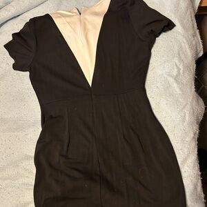 Little Black Dress with splash of white.  Very form fitting and soft